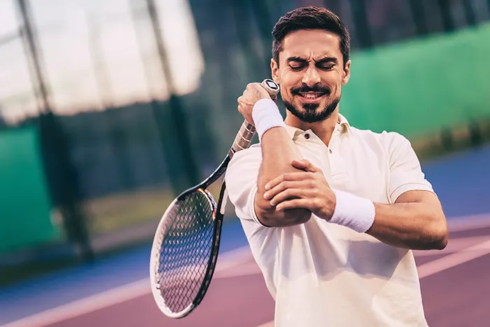 West Side Comprehensive Chiropractic Care - How Chiropractic Care Improves Grip Strength After Tennis Elbow